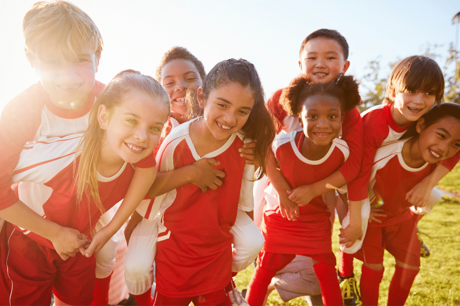 children in soccer uniforms